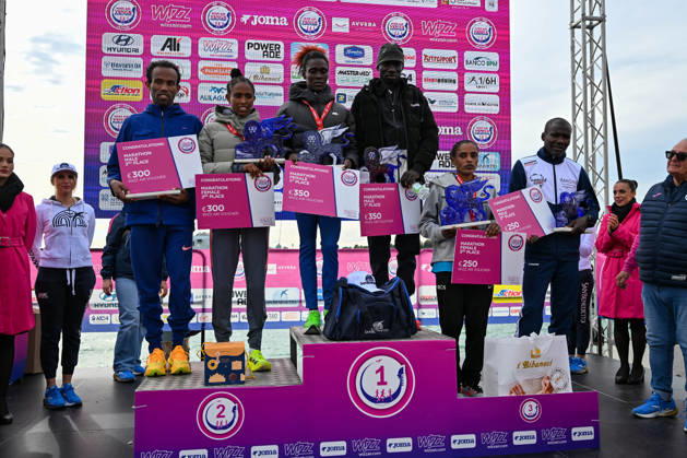 TRACK AND FIELD - Marathon - 40th Venice Marathon 2026 Photo by IPA ABACAPRESS.COM90162064 - The podium with the men s and women s winners at the 40th Venice Marathon 2026, a marathon race in Venice, Italy, on October 25, 2026 Venice Italy  Copyright: xIPAxSport ABACAx
