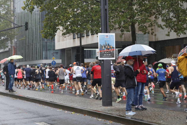 October 25, 2026 Track and Field 43 Mainova Frankfurt Marathon in the rain Spectators with umbrellas Frankfurt, Main, Hesse, Germany