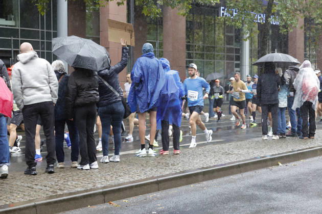 October 25, 2026 Track and Field 43 Mainova Frankfurt Marathon in the Rain Spectators with Umbrellas Frankfurt, Main, Hesse, Germany