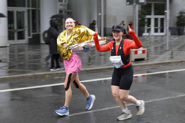 October 25, 2026 Track and Field 43 Mainova Frankfurt Marathon: Here, two female runners are enjoying the race despite the wind and rain Frankfurt, Main, Hesse, Germany