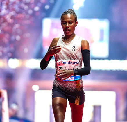 Ethiopian Zeineba Yimer Wins the Mainova Frankfurt Marathon in 2:19:45:25:10:26—A Triumphant Finish at the Festhalle. Zeineba Yimer of Ethiopia wins the women’s race at the Mainova Frankfurt Marathon with a winning time of 2:19:45 hours Frankfurt Festhalle Hesse Germany JRW02173