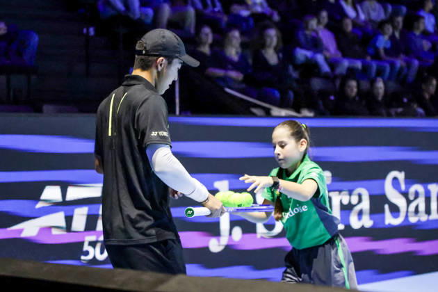 RECORD DATE NOT STATED 25th October 2026; St. Jakobshalle, Basel, Switzerland; ATP, Tennis Herren Tennis, Swiss Indoors Basel, Day 2; Qualifying final; Rinky Hijikata of Australia receives balls from a ball kid AnthonyxBenoit