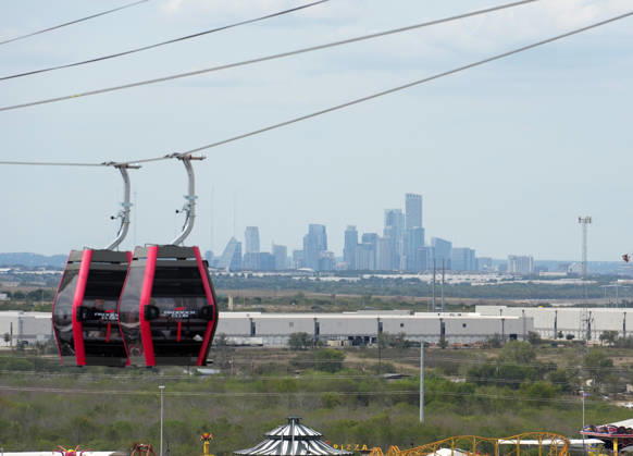 October 25, 2026, Circuit of The Americas, Austin, 2026 FORMULA 1 MSC CRUISES UNITED STATES GRAND PRIX, Shuttles travel back and forth between the main building in the paddock and the new station at the first turn, with the Austin skyline in the background. Photo by Hasan Bratic, DeFodi Images