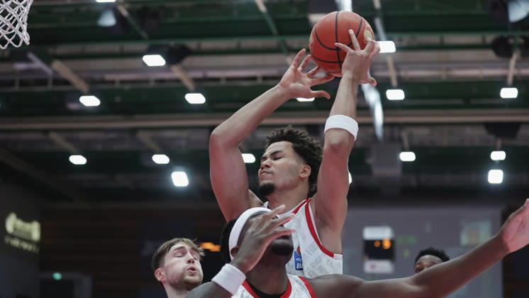 Pictured from left: Elias Roedl (NINERS Chemnitz, 11), Charles Thompson (Wuerzburg Baskets, 32), and Brandon Tischler (Wuerzburg Baskets, 8) in a battle for rebounds on October 26, 2026,Fitness First Würzburg Baskets vs. NINERS Chemnitz, easyCredit BBL, Matchday 6, Germany, 97072, tectake Arena Würzburg, Copyright: HMBxMedia xJulienxBecker