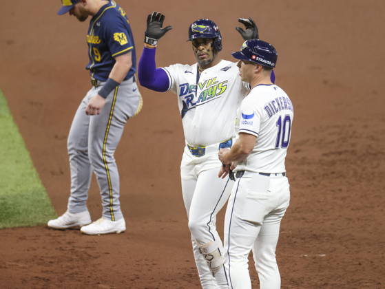 MLB, Baseball Herren, USA World Series Game 3 - Tampa Bay Rays v Milwaukee Brewers Tampa Bay Rays designated hitter Yandy Diaz (C) on first base after hitting a single during the Major League Baseball (MLB) World Series Game 3 between the Milwaukee Brewers and Tampa Bay Rays at Tropicana Field in St. Petersburg, Florida, USA, 26 October 2026. ST. PETERSBURG FLORIDA UNITED STATES  Copyright: xGARYxBOGDONx