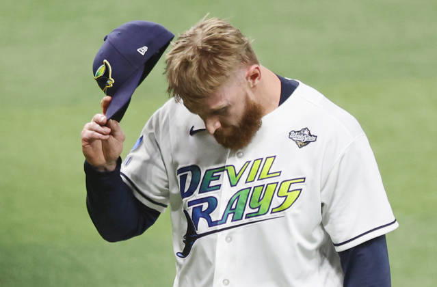 Tampa Bay Rays pitcher Cam Booser leaves the game after giving up four runs to the Milwaukee Brewers in the fifth inning during game three of the 2026 MLB, Baseball Herren, USA World Series at Tropicana Field in St Petersburg, Florida, on Monday, October 26, 2026.  TPB20261026744 AARONxJOSEFCZYK