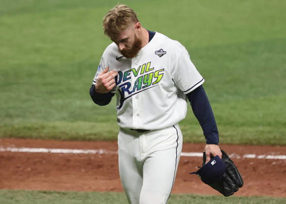 Tampa Bay Rays pitcher Cam Booser leaves the game after giving up four runs to the Milwaukee Brewers in the fifth inning during game three of the 2026 MLB, Baseball Herren, USA World Series at Tropicana Field in St Petersburg, Florida, on Monday, October 26, 2026.  TPB20261026745 AARONxJOSEFCZYK