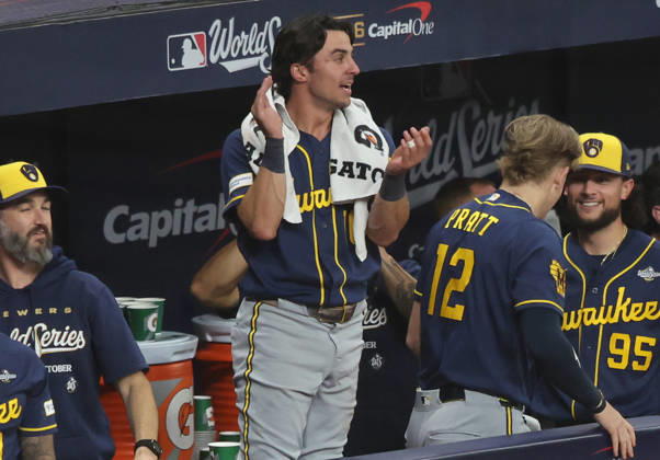 Milwaukee Brewers Sal Frelick (10) celebrates in the dugout after scoring against the Tampa Bay Rays on a single by Brewers David Hamilton in the fifth inning during game three of the 2026 MLB, Baseball Herren, USA World Series at Tropicana Field in St Petersburg, Florida, on Monday, October 26, 2026.  TPB20261026747 AARONxJOSEFCZYK