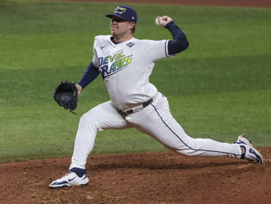 MLB, Baseball Herren, USA World Series Game 3 - Tampa Bay Rays v Milwaukee Brewers Tampa Bay Rays pitcher Garrett Cleavinger in action during the 7th inning of the Major League Baseball (MLB) World Series Game 3 between the Milwaukee Brewers and Tampa Bay Rays at Tropicana Field in St. Petersburg, Florida, USA, 26 October 2026. ST. PETERSBURG FLORIDA UNITED STATES  Copyright: xGARYxBOGDONx