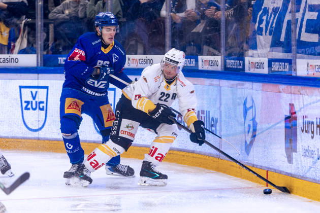 Santeri Alatalo 22 (HC Lugano) and Nik Petrovic 11 (EV Zug) 27 10 2026 National League, Regular Season, Ice Hockey, OYM Hall, Zug EV Zug HC Lugano Photo by  Copyright: xJustPictures.ch PhilippxHegglinx