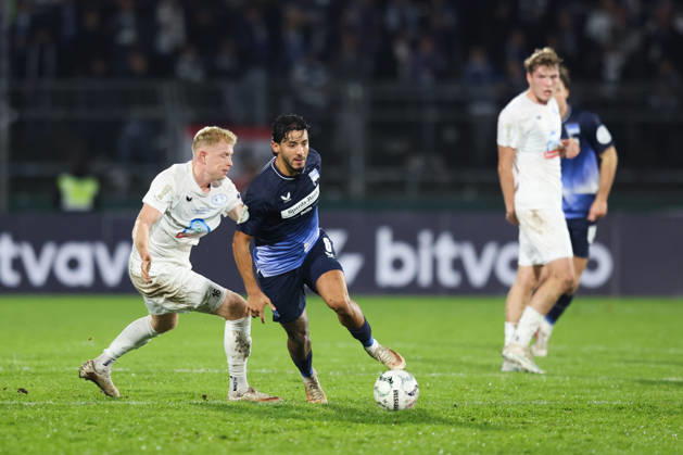 October 28, 2026, Soccer, Men s, DFB Cup, 2nd Round, SSV Jeddeloh II vs. Hertha BSC Berlin, Kevin Sessa 8 (Hertha BSC Berlin) in a tackle with Robin Krolikowski 16 (SSV Jeddeloh II)