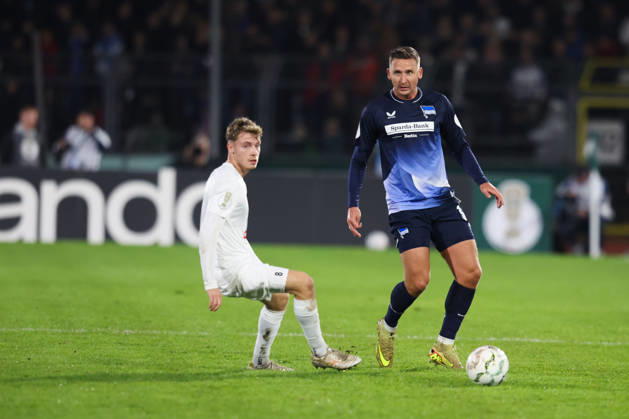 October 28, 2026, Soccer, Men s, DFB Cup, 2nd Round, SSV Jeddeloh II vs. Hertha BSC Berlin; Moritz Brinkmann 8 (SSV Jeddeloh II) in a tackle with Paul Seguin 30 (Hertha BSC Berlin)