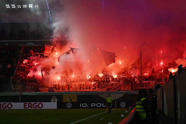 Paderborn, Home Deluxe Arena, October 28, 2026, GER, Men s, DFB Cup, 2nd Round, 2026–2027 Season, SC Paderborn vs. VfB Stuttgart, Image: Fan section, fans, Stuttgart fan block, fire, smoke, Bengali, Bengalis, Bengali fire, lighting fireworks, smoke bomb. For editorial use only. DFB regulations prohibit any use of photographs as image sequences and or quasi-video. North Rhine-Westphalia, Germany