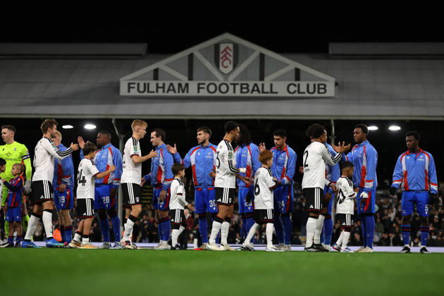 28th October 2026; Craven Cottage, London, England; Carabao Cup Football, Fulham versus Crystal Palace; Both sets of players shake hands before kick off JohnxPatrickxFletcher