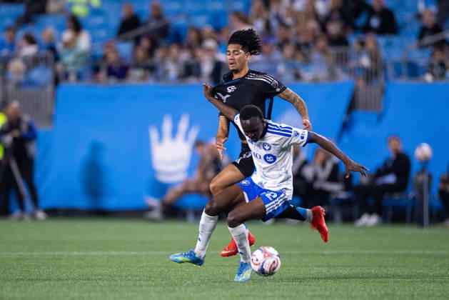 October 28, 2026: CF Montreal midfielder Victor Loturi (22) blocks Charlotte FC forward Idan Toklomati (9) during the first half of the MLS, Fussball Herren, USA match up at Bank of America Stadium in Charlotte, NC. Mandatory Credit: -Cal Media Charlotte United States - ZUMAc04_ 20261028_zma_c04_012 Copyright: xScottxKinserx