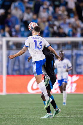 October 28, 2026: CF Montreal defender Luca Petrasso (13) heads the ball over Charlotte FC forward Rodolfo Aloko (37) during the first half of the MLS, Fussball Herren, USA match up at Bank of America Stadium in Charlotte, NC. Mandatory Credit: -Cal Media Charlotte United States - ZUMAc04_ 20261028_zma_c04_027 Copyright: xScottxKinserx