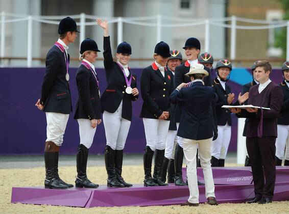 OLYMPIA 2012, Equestrian Military Team Princess Anne presents silver medal to her daughter Zara Phillips