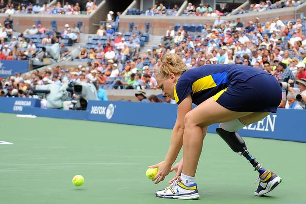 Tennis, US Open - Balljungen und Maedchen mit Prothesen