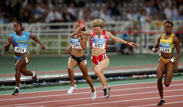 Olympics 2004 - Athletics, Yuliya Nesterenko wins the Women's 100m Sprint