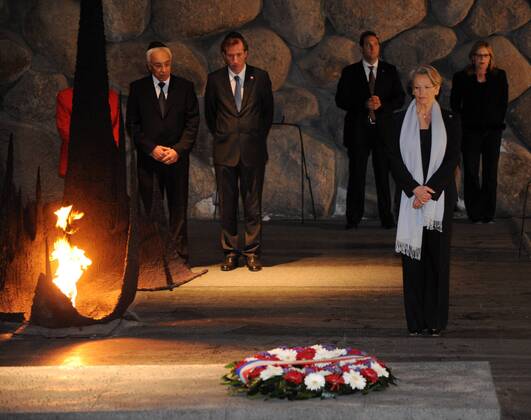 The Foreign Minister of France, Michele Alliot-Marie, pauses for a moment of silence in memory of the victims of the Holocaust in the Hall of Remembrance in the Yad Vashem Holocaust Museum in Jerusalem, Israel, January 20, 2011.  JER2011012010