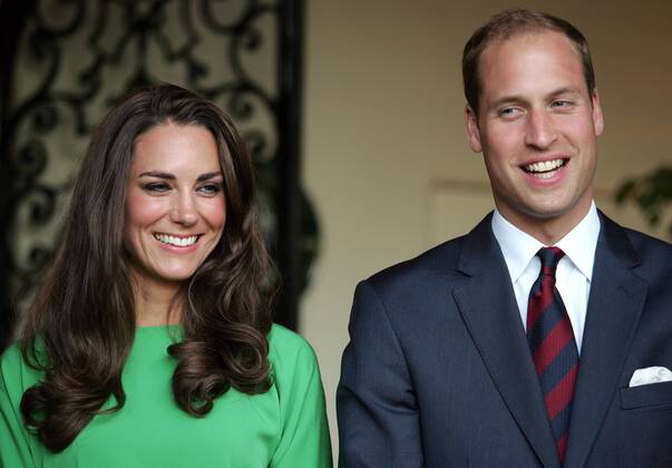 Prince William and his wife Kate, the Duke and Duchess of Cambridge, look on during a private reception at the British Consul-General s residence in Los Angeles on July 8, 2011.  LAP2011070848