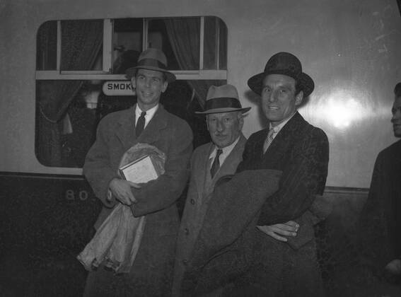 FJ.Perry returns from America to make first professional appearance in England. Fred Perry with his father and Ellsworth Vines on arrival at Paddington. 21st May 1937 UnitedArchives00134208 
