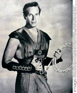 Charlton Heston in Ben-Hur: A Tale of the Christ is a sword-and-sandal historical fiction epic originally depicted in the 1880 book by American general and author Lew Wallace. Ben-Hur: A Tale of the Christ has since been adapted into a Broadway play, silent films, talkies, and a musical. Â UnitedArchives00935404 