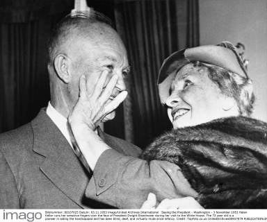 Seeing the President - Washington - 3 November 1953 Helen Keller runs her sensitive fingers over the face of President Dwight Eisenhower during her visit to the White House. The 73 year old is a pioneer in aiding the handicapped and has been blind, deaf, and virtually mute since infancy. Credit: TopFoto.co.uk UnitedArchives00937079 