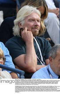 US Open 2013, USTA Billie Jean King National Tennis Center, Flushing Meadows, New York,ITF Grand Slam Tennis Tournament . Sir Richard Branson als Zuschauer auf der Tribuene,Halbkoerper,Hochformat,VIP,Feature,