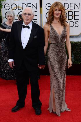 Actor Bruce Dern (L) and actress Laura Dern arrive for the 71st annual Golden Globe Awards at the Beverly Hilton Hotel in Beverly Hills, California on January 12, 2014.  LAP20140112206
