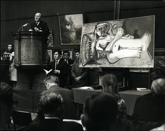 Apr. 24, 1968 - A Picasso sold for &pound;28,000 Art Sale at Sotheby s - A sale of Impressionist and Modern Paintings, Drawings and Sculpture, was held today at Sotheby s. Keystone Photo Shows:- The scene at Sotheby s this morning, during the sale of Femme couchee au Chat by Pablo Picasso, which was sold by &pound;28,000.  - ZUMAk09