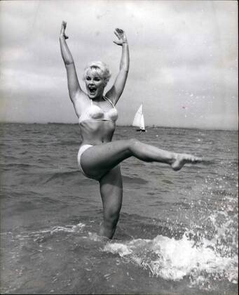 Feb. 29, 2012 - Its Keep Moving temperature in the Briny. Elke Sommer , 19 year old German actress , location shooting at West Wittering with Richard Todd for Don t bother to Knock , enjoys the water but finds the temperature such that vigour and movement is needed to keep her warm.  - ZUMAk09