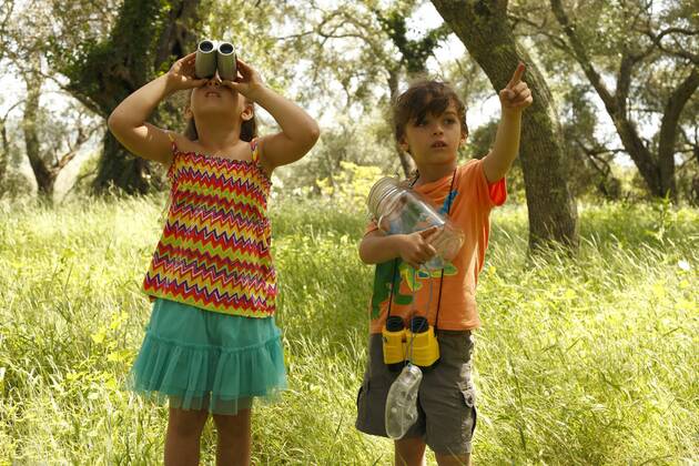 Greece, Ionic Islands, Corfu, boy and girl exploring the wilderness model released  AJF000053