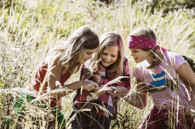 Three girls exploring the nature model released  HHF004817
