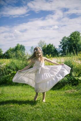 Girl in white summer dress on meadow model released  SARF000680