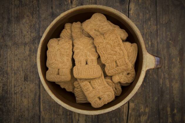 Bowl of almond biscuits on wood  LVF002440