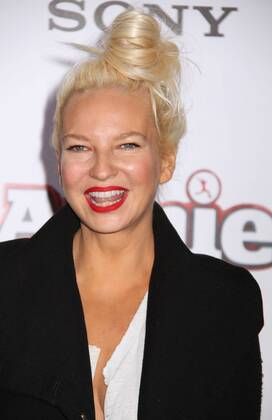 Dec. 7, 2014 - New York, New York, U.S. - Singer SIA attends the world premiere of Annie held at the Ziegfeld Theater. - ZUMAk03