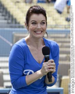April 7, 2013 - Los Angeles, California, U.S - Actress BELLAMY YOUNG prepares to sing the National Anthem during pre game festivities before the Los Angeles Dodgers play the Pittsburgh Pirates at Dodgers Stadium.  - ZUMAp12