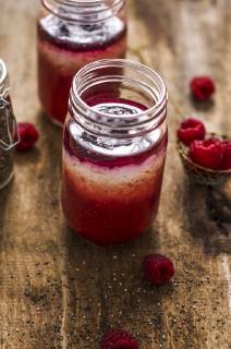 Homemade yogurt with raspberry puree and chia seeds on wood  ODF001362