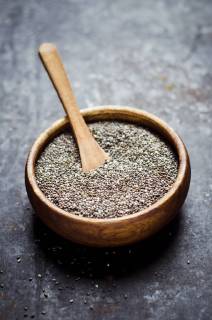 Wooden bowl of black chia seeds  CZF000245