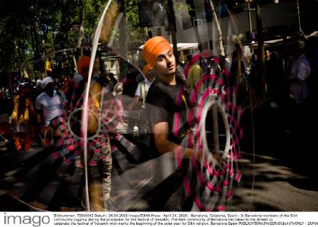 April 24, 2016 - Barcelona, Catalonia, Spain - In Barcelona members of the Sikh community juggling during the procession for the festival of Vaisakhi. The Sikh community of Barcelona has taken to the streets to celebrate the festival of Vaisakhi wich marks the beginning of the solar year for Sikh religion. Barcelona Spain - ZUMAb137