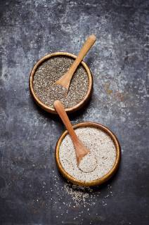 Wooden bowls of black and white chia seeds  CZF000247