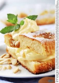 Slices of apricot sponge cake with pudding cream Apricot sponge cake with pudding cream  xdigifoodstockx CTKPhoto201510150700301