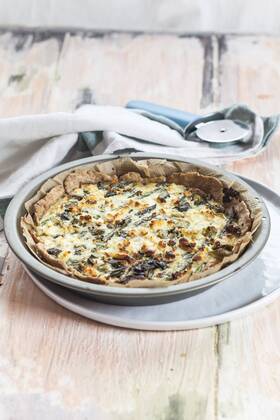 Baking dish of green asparagus tart with feta cheese  SBDF002943