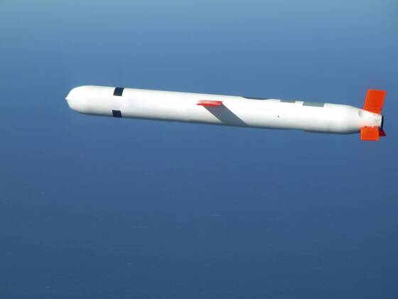 China Lake, California, November 10, 2002 - A Tactical Tomahawk Block IV cruise missile conducts a controlled flight test over the Naval Air Systems Command (NAVAIR) western test range complex in southern California. The Tactical Tomahawk, the next generation of Tomahawk cruise missile, adds the capability to reprogram the missile while in-flight to strike any of 15 preprogrammed alternate targets, or redirect the missile to any Global Positioning System (GPS) target coordinates. It also will be able to loiter over a target area for some hours, and with its on-board TV camera, will allow the war fighting commanders to assess battle damage of the target, and, if necessary redirect the missile to any other target. Copyright: StocktrekxImages stk103041m