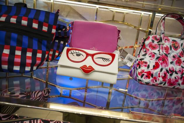 Kate Spade boutique in Macy s in New York A novelty Kate Spade bag in the Kate Spade boutique within Macy s Herald Square in New York on Tuesday, August 9, 2016. (  RichardxB.xLevine