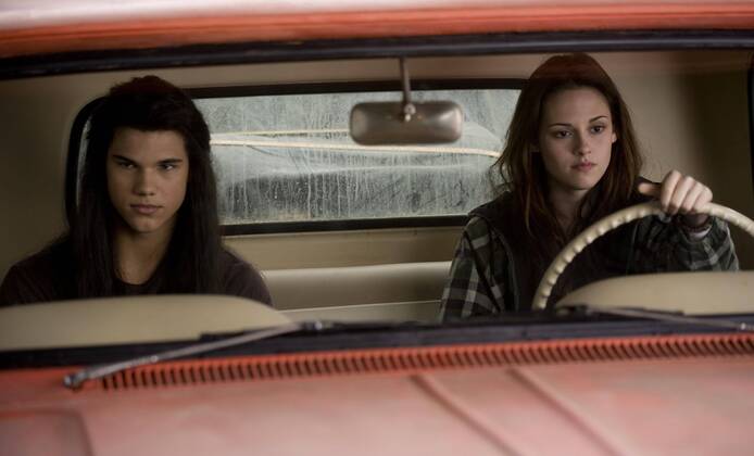 RELEASE DATE: November 20, 2009. MOVIE TITLE: Twilight: New Moon. STUDIO: Imprint Entertainment. PLOT: After Bella recovers from the vampire attack that almost claimed her life, she looks to celebrate her birthday with Edward and his family. However, a minor accident during the festivities results in Bella s blood being shed, a sight that proves too intense for the Cullens, who decide to leave the town of Forks, Washington for Bella and Edward s sake. Initially heartbroken, Bella finds a form of comfort in reckless living, as well as an even-closer friendship with Jacob Black. Danger in different forms awaits. PICTURED: KRISTEN STEWART as Bella Swan and TAYLOR LAUTNER as Jacob Black. - ZUMAg90_