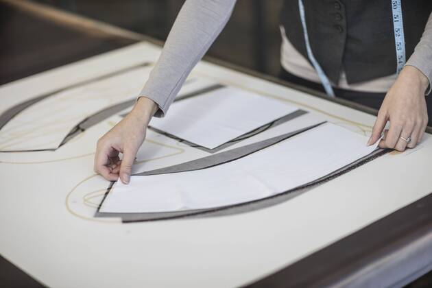 Close-up of woman working on template in tailor shop model released Symbolfoto property released  ZEF10679