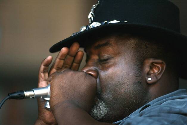 Renaud Perry plays harmonica with the Homemade Jamz Band from Mississippi play on the main stage at the 24th Annual Monterey Bay Blues Festival in Monterey, Calif. on Saturday June 27, 2009..(Orville Myers Monterey County Herald) .  - ZUMABlue Monterey Bay Blues Festival