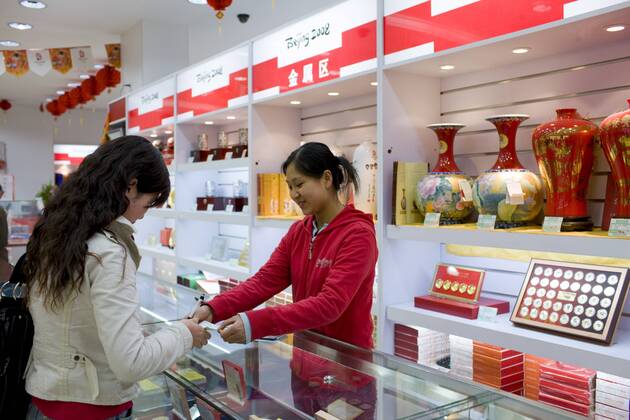 2008 Beijing Olympic Games souvenir shop in an upmarket department store, Wangfujing Street, Beijing, China Copyright: TimxGraham 1161-3692